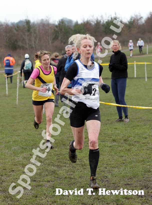 Battle to finish between No 2 Keith Miller (David Loyd Redway Runners) 45-49 and Michael Hager (Tipton) 60-64 winner, males 35 to 64race, BMAF Cross Country, Herrington, Sunderland.